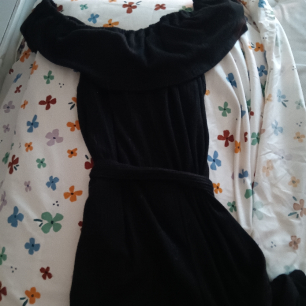 Black off the shoulder flared romper